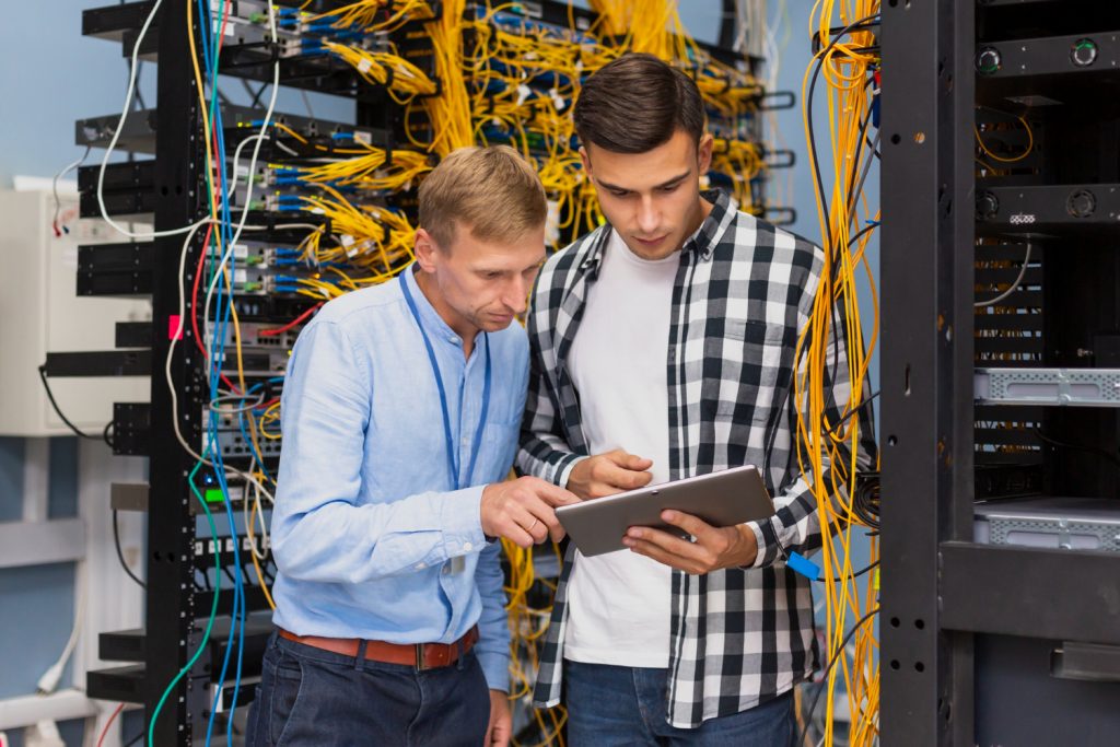 man checking cable